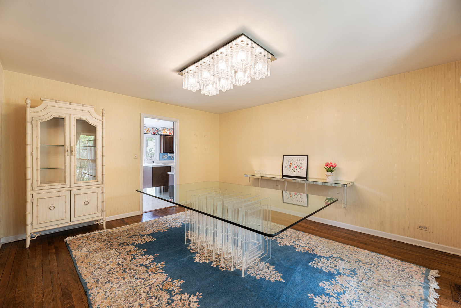 3210 Old Mill Road Northbrook, IL 60062 - Photo 23 of 41 a view of a livingroom with wooden floor and a ceiling fan