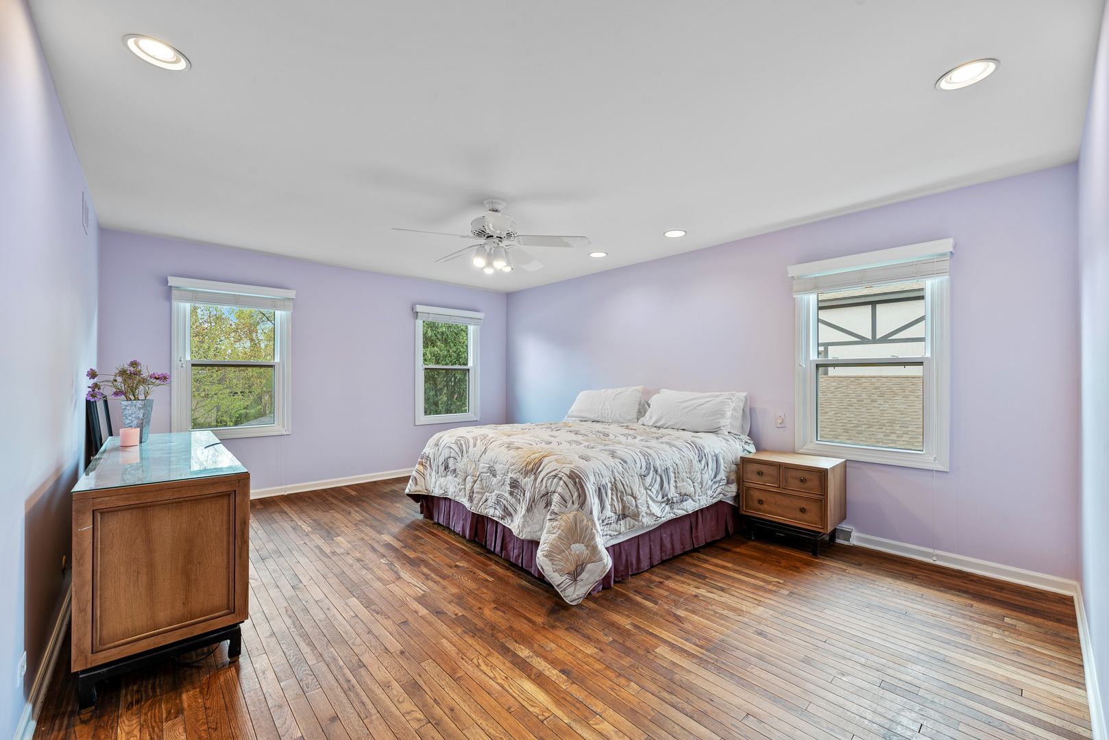 3210 Old Mill Road Northbrook, IL 60062 - Photo 26 of 41 a spacious bedroom with a bed and wooden floor
