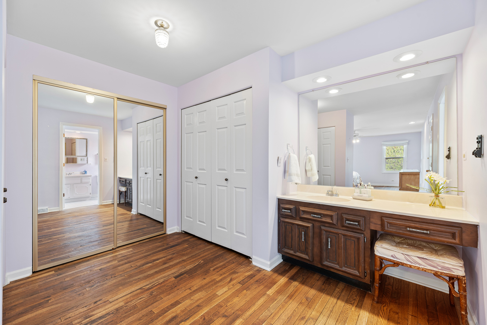 3210 Old Mill Road Northbrook, IL 60062 - Photo 27 of 41 a bathroom with a sink and a mirror