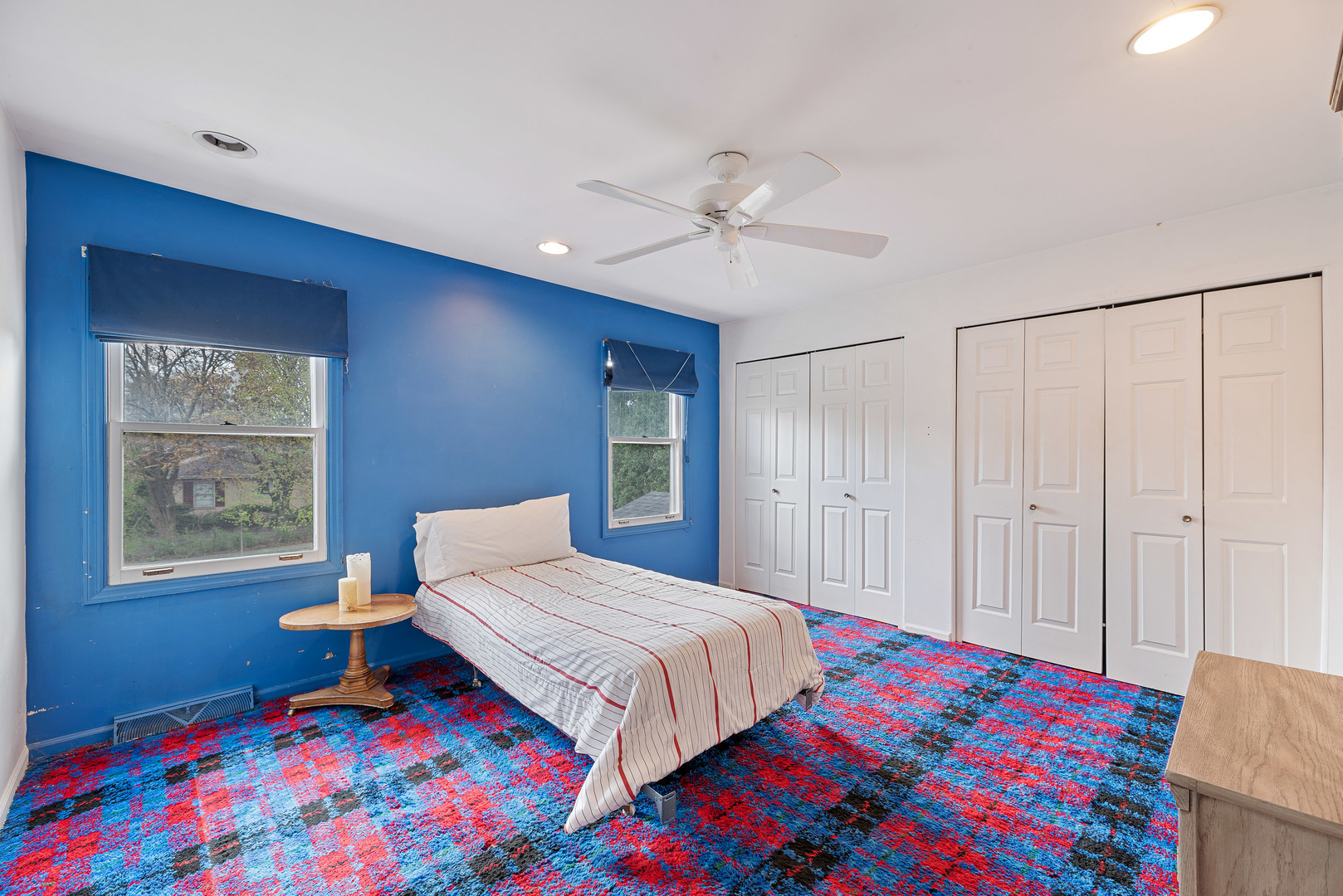 3210 Old Mill Road Northbrook, IL 60062 - Photo 32 of 41 a bedroom with a bed a dresser and a window