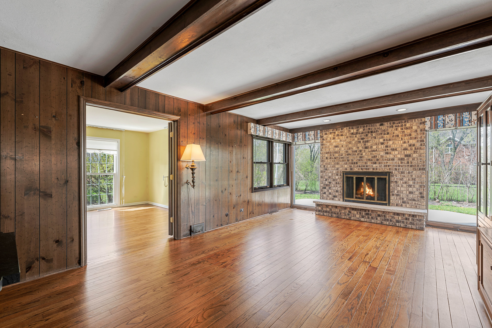 3210 Old Mill Road Northbrook, IL 60062 - Photo 8 of 41 a view of an empty room with wooden floor and a window