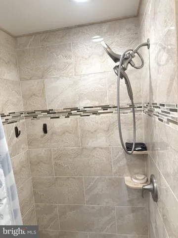 a view of a lake with houses in the back