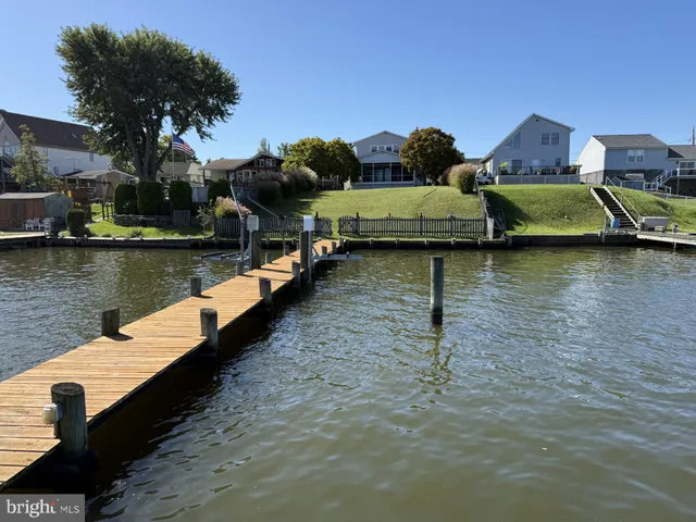 a view of a swimming pool with a lounge chairs