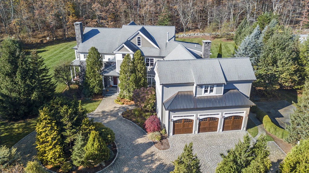 2 Stonegate Lane Dover, MA 02030 - Photo 1 of 28 an aerial view of a house with a yard