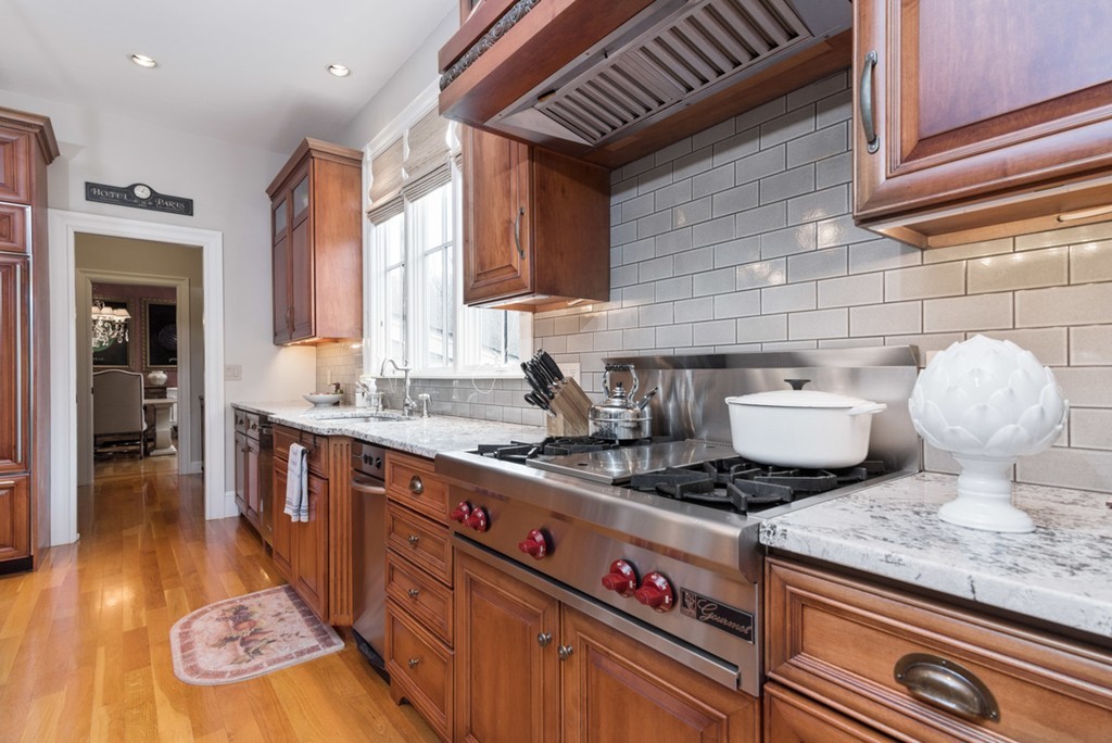 2 Stonegate Lane Dover, MA 02030 - Photo 11 of 28 a kitchen with a stove and cabinets