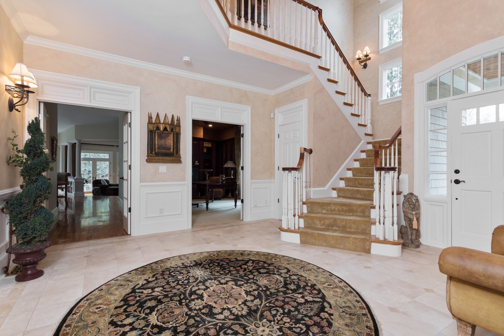 2 Stonegate Lane Dover, MA 02030 - Photo 14 of 28 a view of a livingroom with furniture and staircase