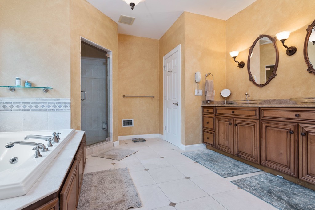 2 Stonegate Lane Dover, MA 02030 - Photo 18 of 28 a spacious bathroom with a tub a mirror and a sink