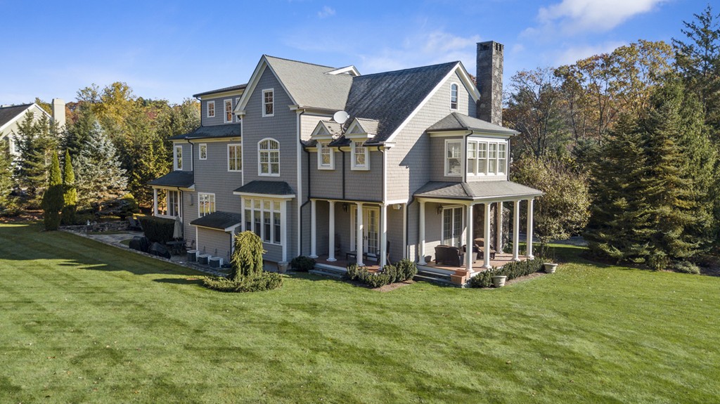 2 Stonegate Lane Dover, MA 02030 - Photo 2 of 28 a view of a house with a yard and large trees