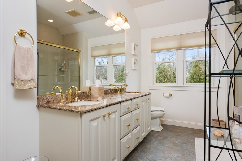 2 Stonegate Lane Dover, MA 02030 - Photo 21 of 28 a bathroom with a double vanity sink a mirror and a shower