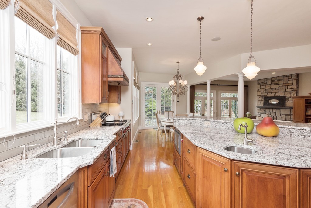 2 Stonegate Lane Dover, MA 02030 - Photo 8 of 28 a kitchen with granite countertop a sink and a large window