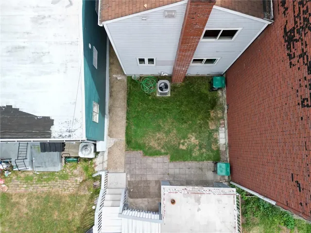 a view of a back yard of the house