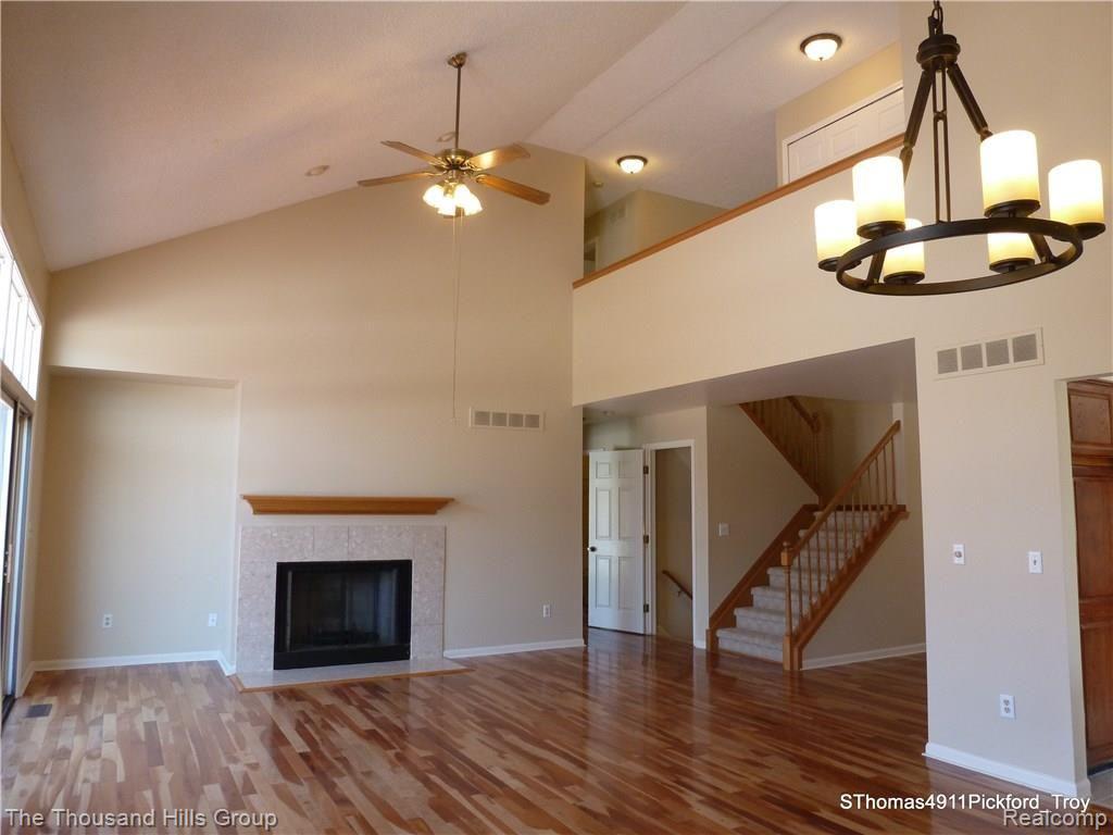4911 Pickford Drive Troy, MI 48085 - Photo 46 of 46 FAMILY ROOM WITH SOARING CEILINGS AND OPEN FLOOR PLAN