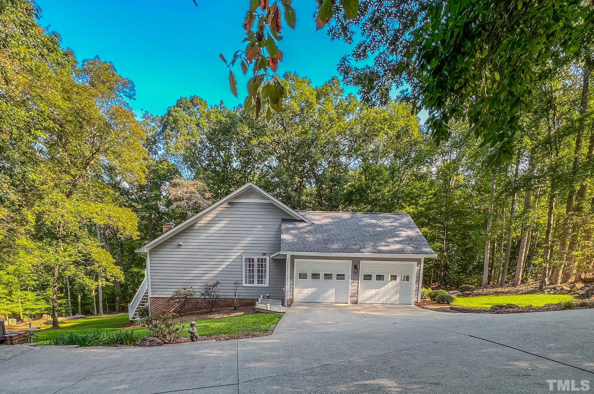 415 North Ridge Circle Roxboro, NC 27574 - Photo 22 of 59 front view of a house with a yard
