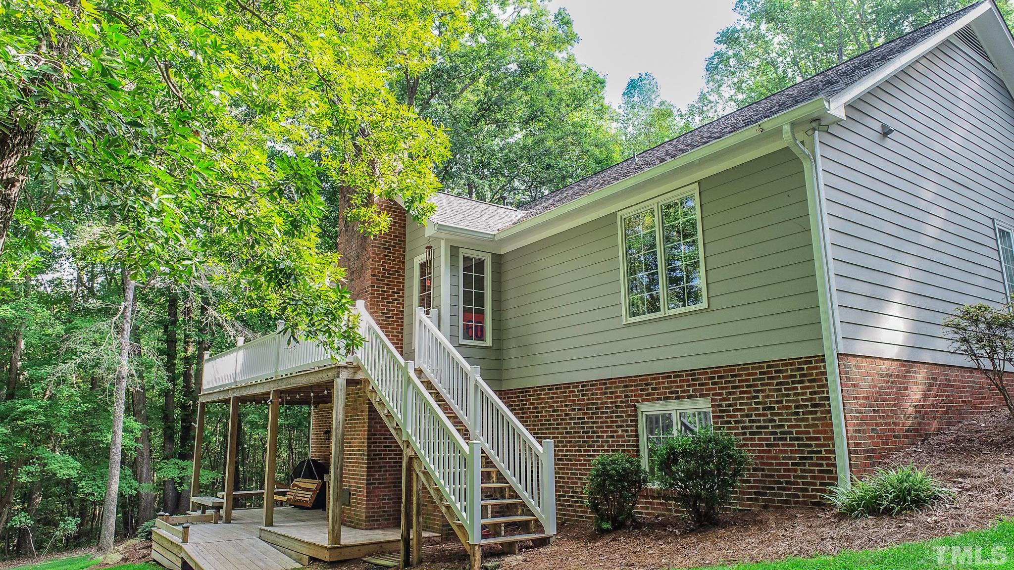 415 North Ridge Circle Roxboro, NC 27574 - Photo 24 of 59 a view of a house with a tree