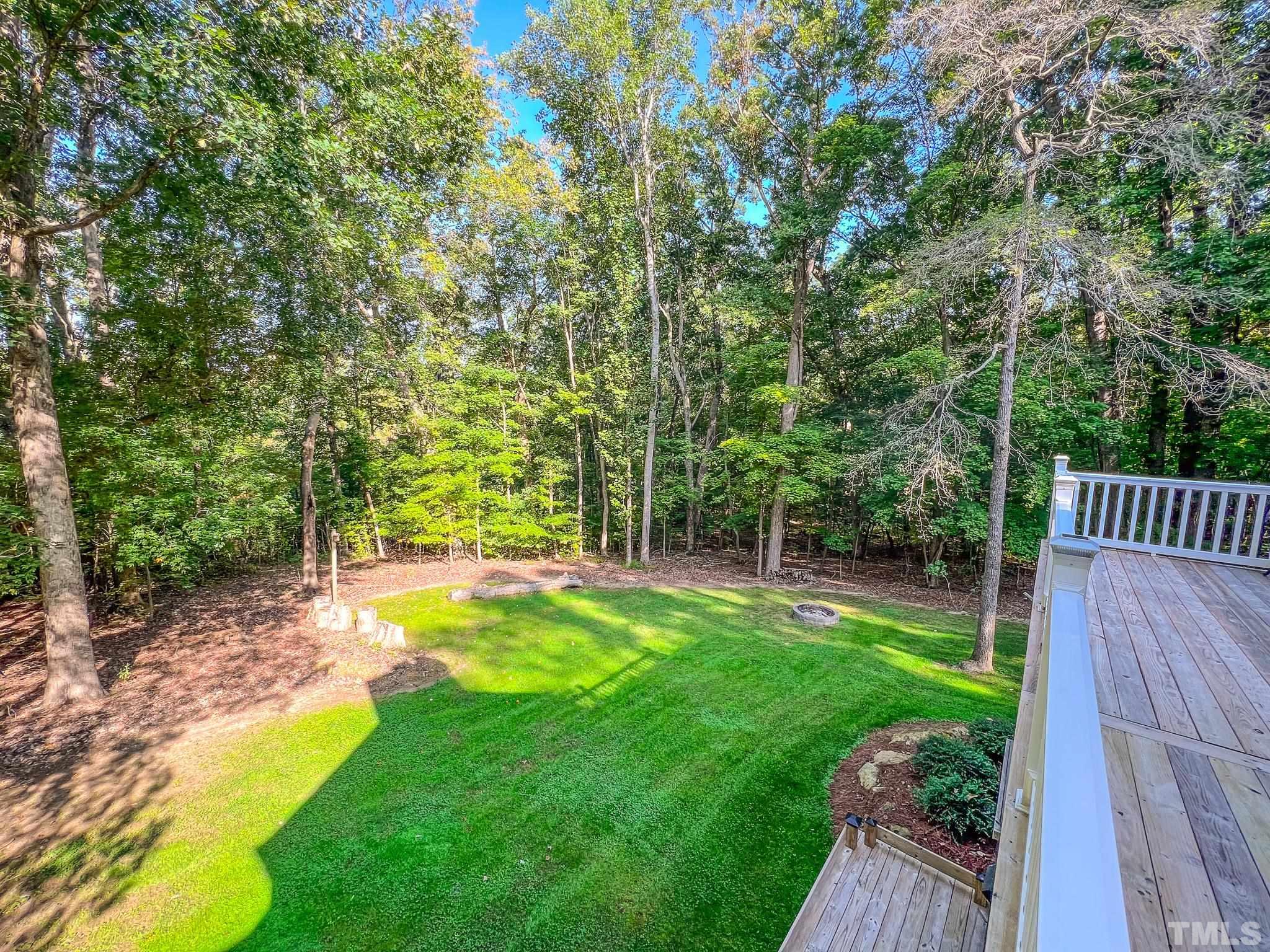 415 North Ridge Circle Roxboro, NC 27574 - Photo 25 of 59 a view of a backyard with a small cabin