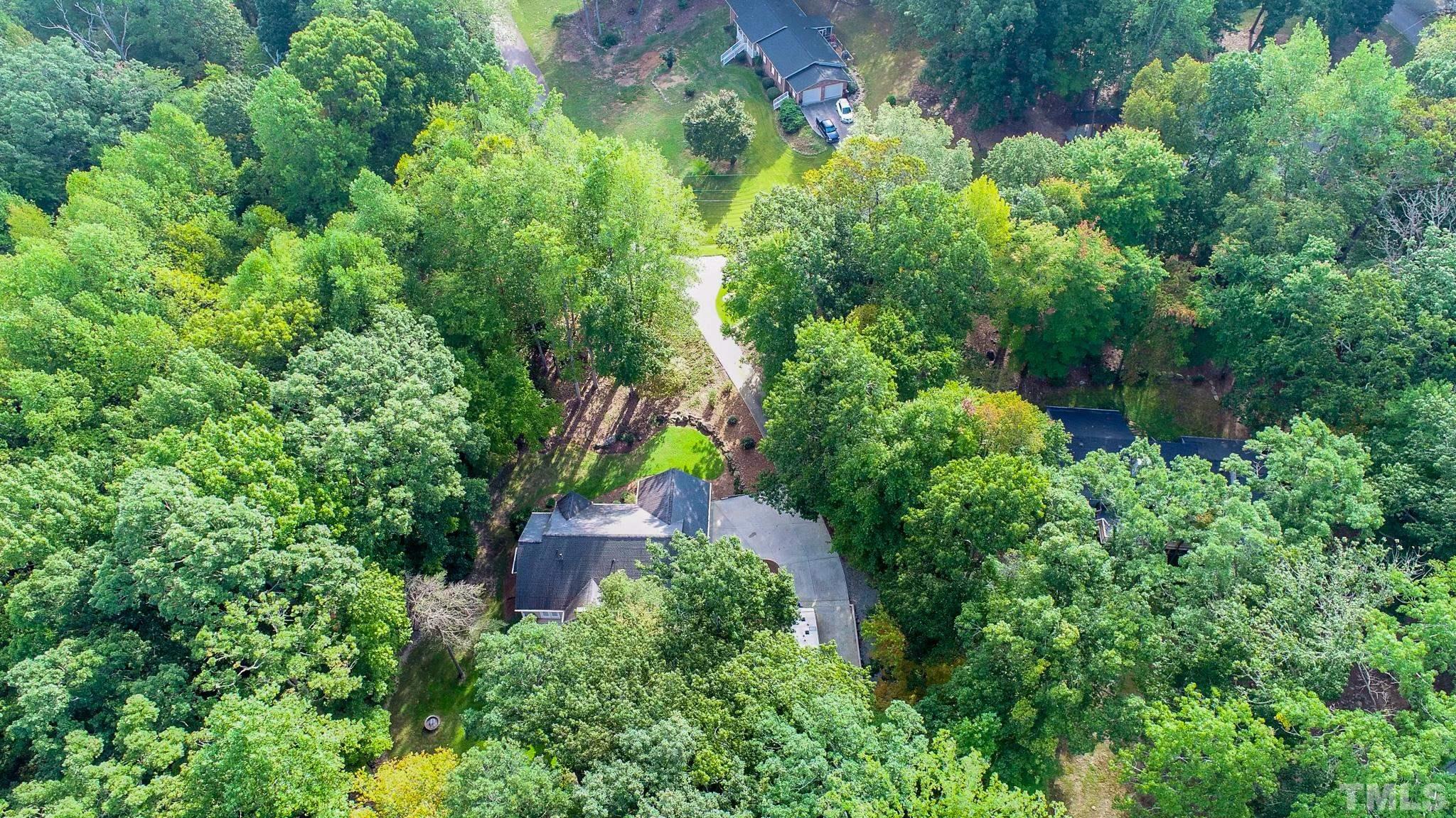 415 North Ridge Circle Roxboro, NC 27574 - Photo 34 of 59 an aerial view of residential house with outdoor space and trees all around