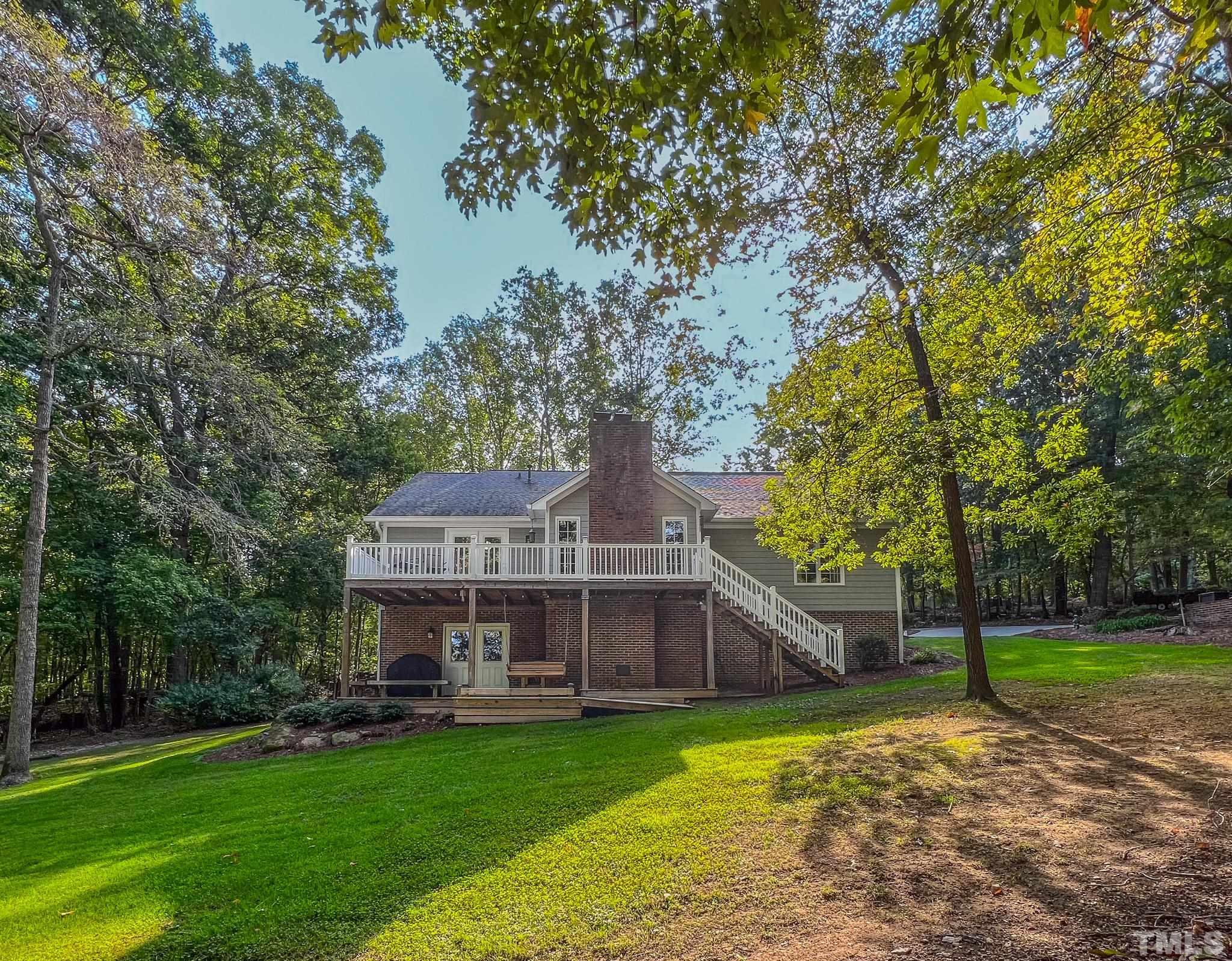 415 North Ridge Circle Roxboro, NC 27574 - Photo 36 of 59 a view of a house with a big yard plants and large trees