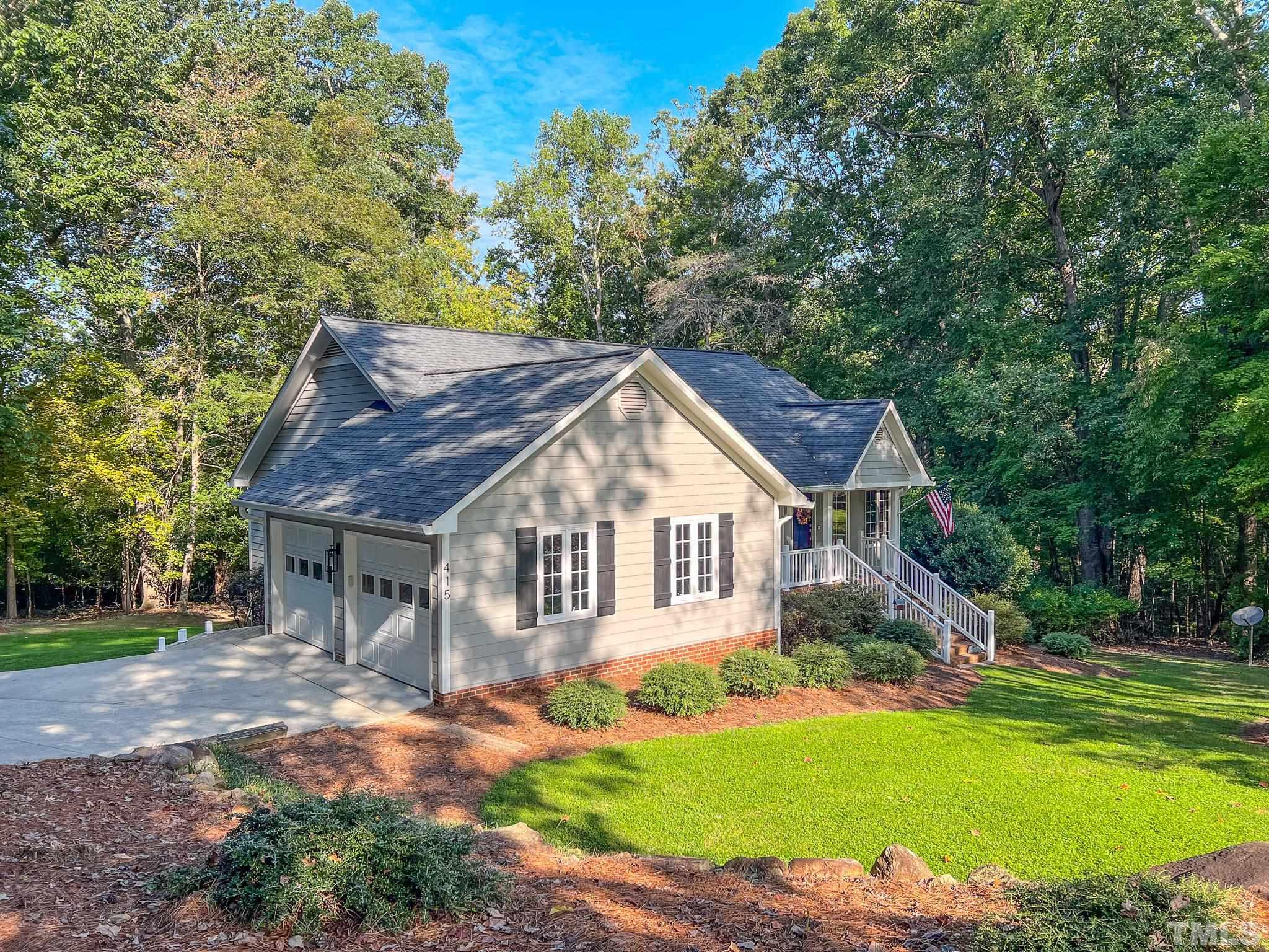 415 North Ridge Circle Roxboro, NC 27574 - Photo 45 of 59 a view of a house with a yard