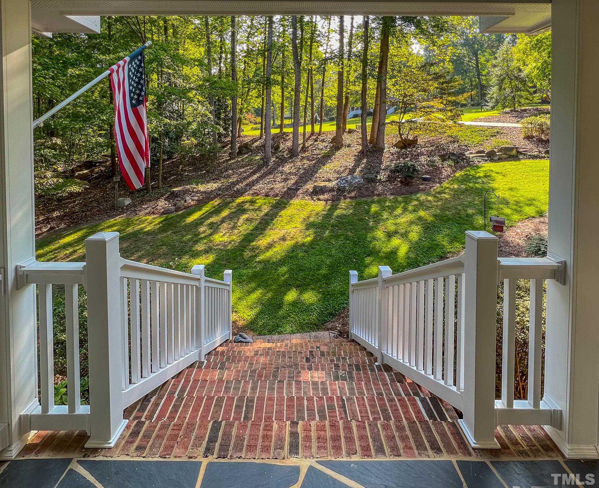 415 North Ridge Circle Roxboro, NC 27574 - Photo 46 of 59 a view of outdoor space with deck and a garden