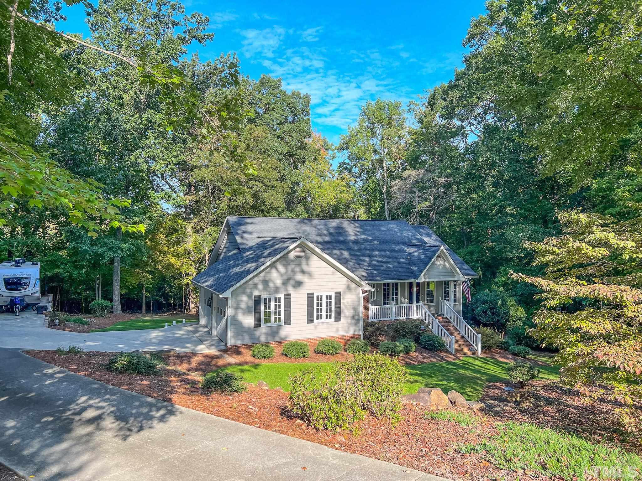 415 North Ridge Circle Roxboro, NC 27574 - Photo 49 of 59 a front view of a house with a yard
