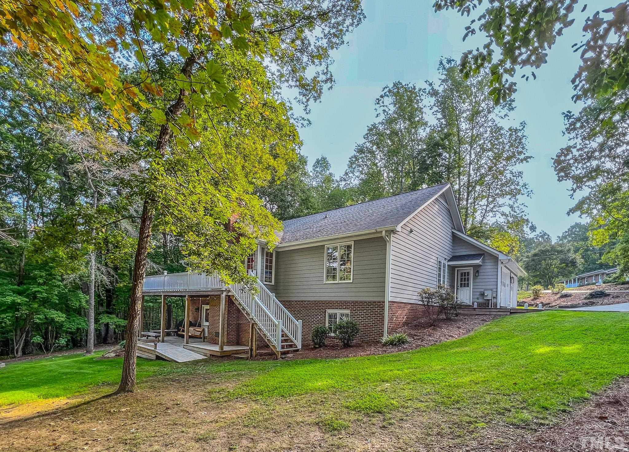 415 North Ridge Circle Roxboro, NC 27574 - Photo 8 of 59 a front view of house with yard and green space