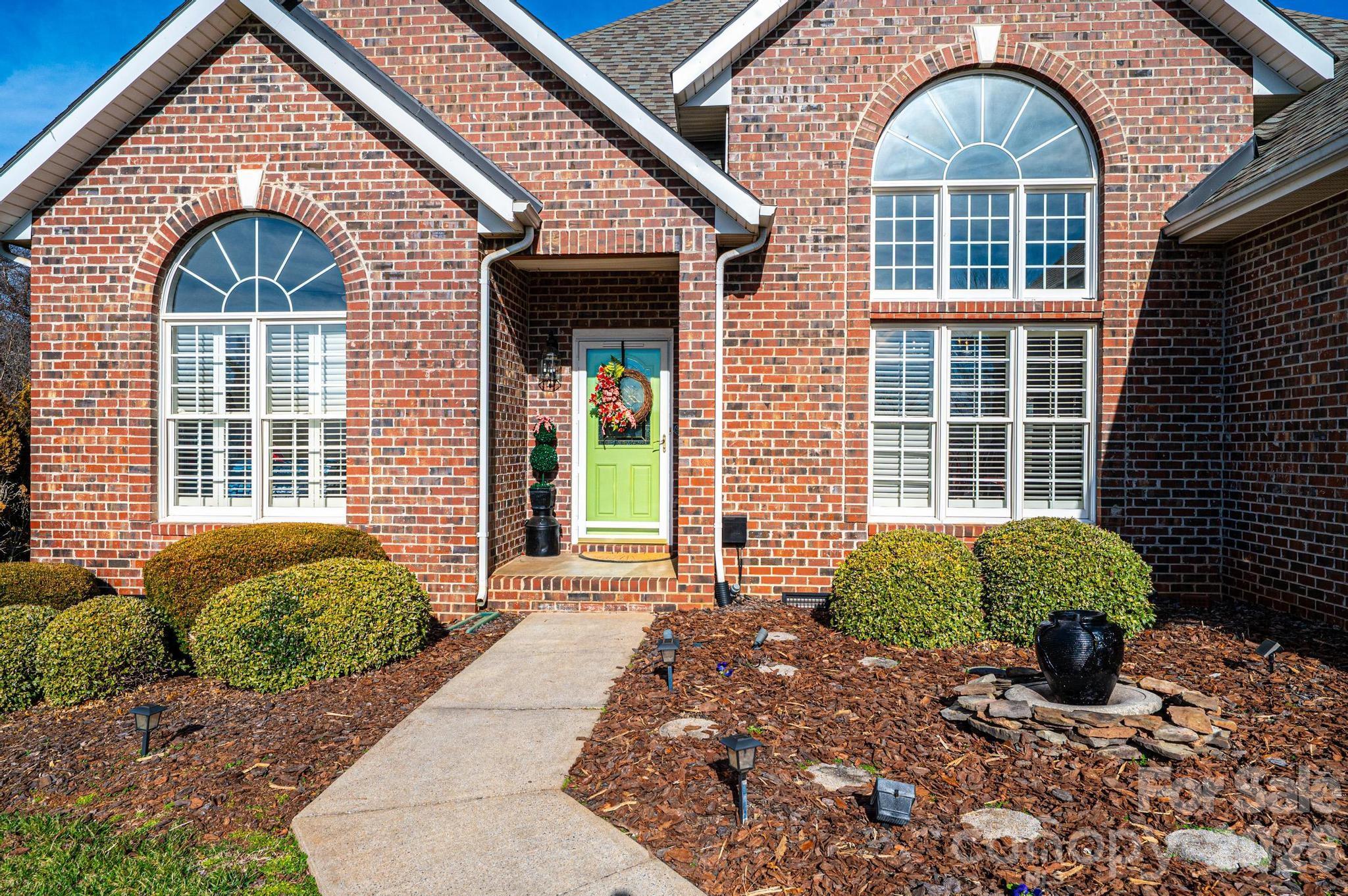 3992 Brickfield Street Hickory, NC 28602 - Photo 3 of 41 a front view of a house with garden