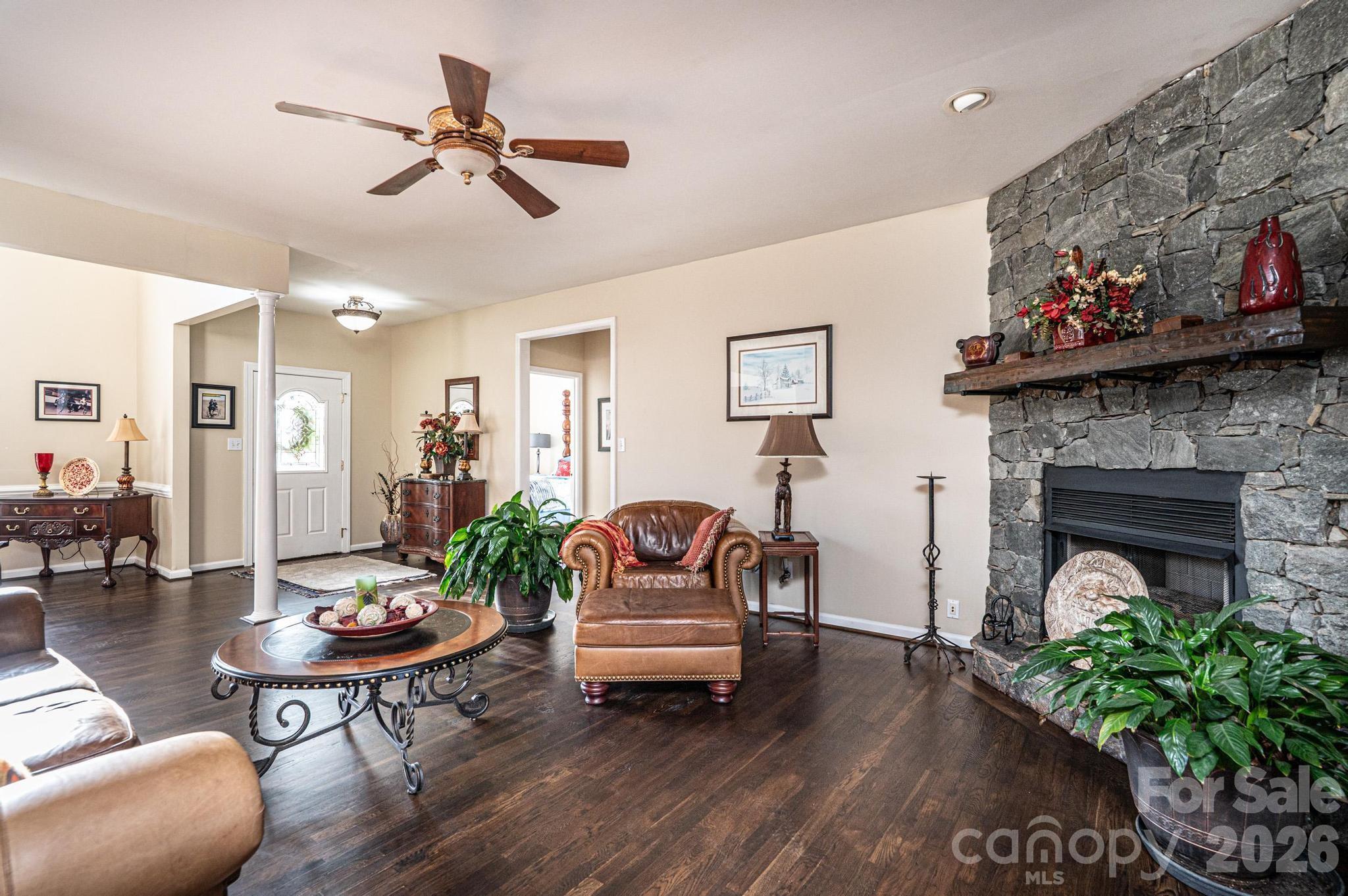 3992 Brickfield Street Hickory, NC 28602 - Photo 10 of 41 a living room with furniture and a fireplace