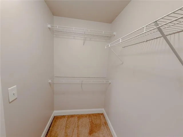 a view of a room with racks on the wall