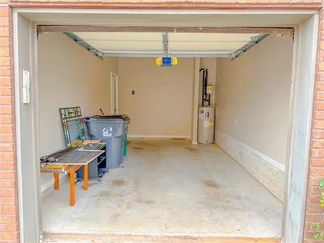 a view of a hallway with seating area