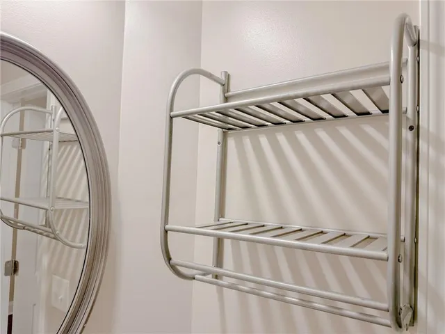 a view of a room with rack on the wall