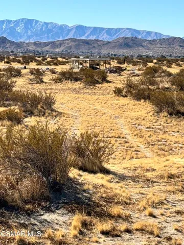 a view of lake and mountain