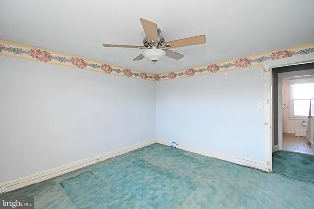 a view of a room with an empty space