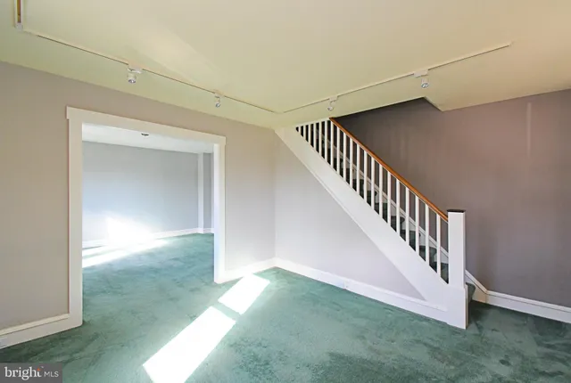 a view of a hallway with entryway