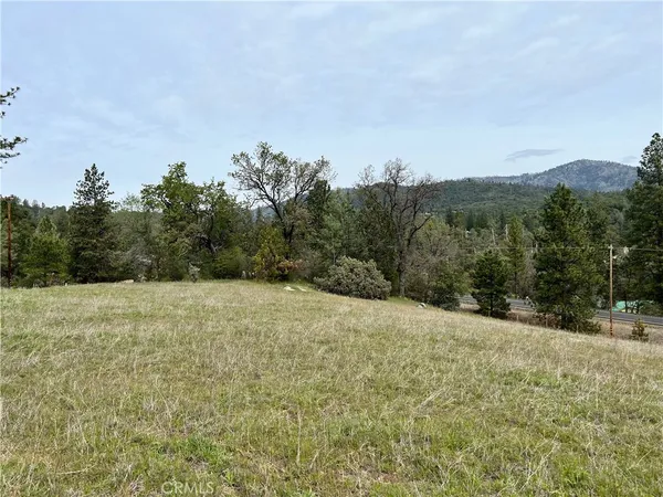 a view of an outdoor space with mountain view