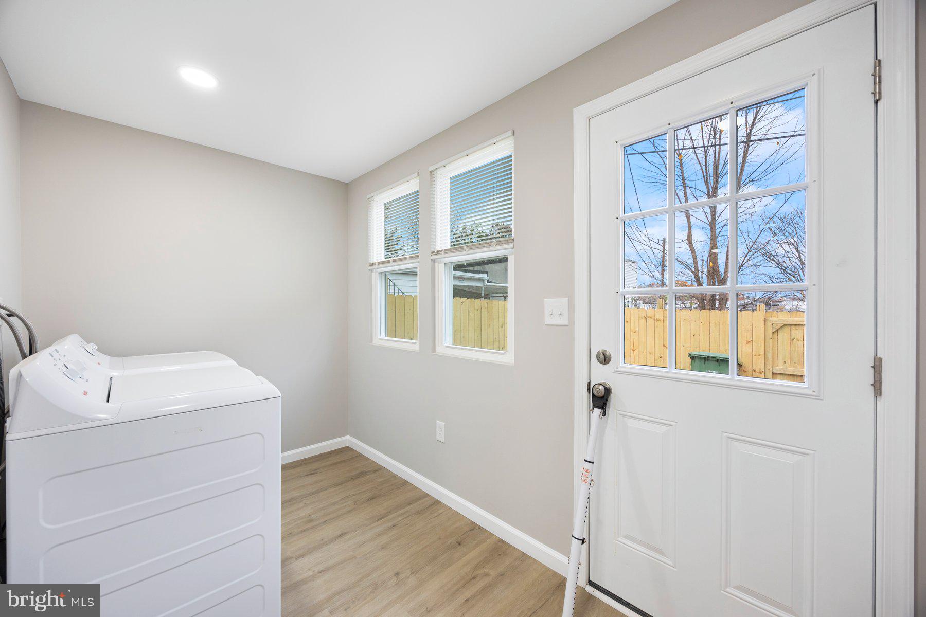 3611 Chestnut Avenue Baltimore, MD 21211 - Photo 17 of 38 a room with a window and wooden floor