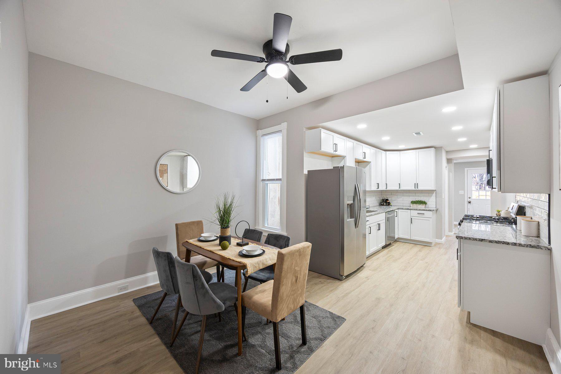 3611 Chestnut Avenue Baltimore, MD 21211 - Photo 10 of 38 a dining room with furniture and window