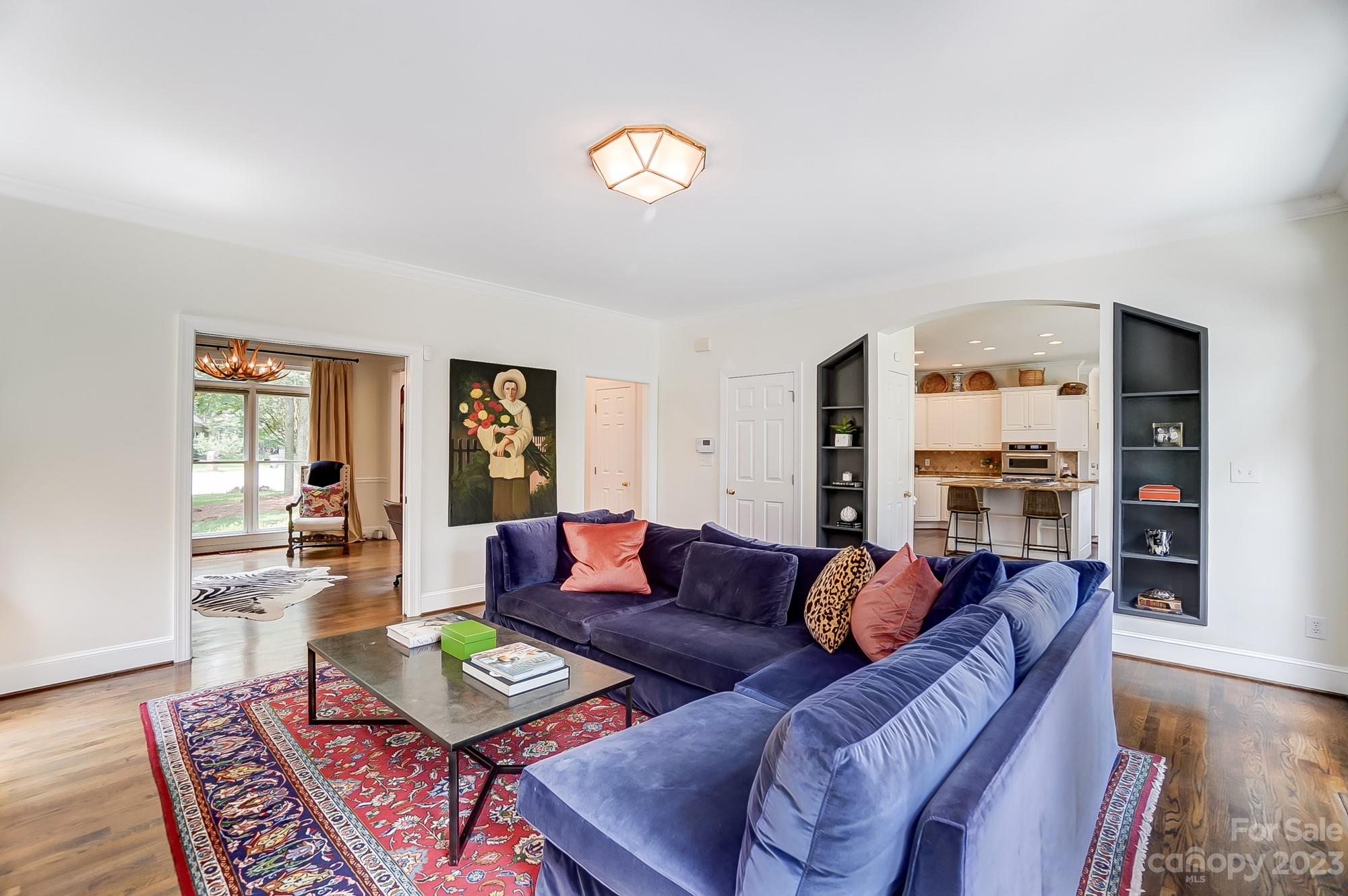 2407 Queensland Drive Charlotte, NC 28270 - Photo 13 of 42 a living room with furniture and wooden floor