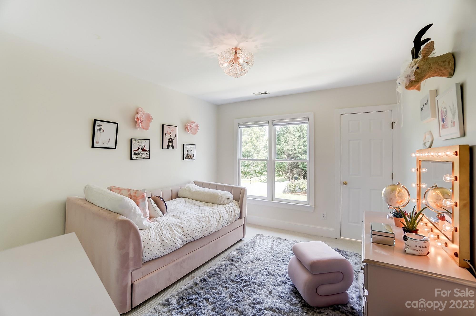 2407 Queensland Drive Charlotte, NC 28270 - Photo 28 of 42 a living room with furniture and a window