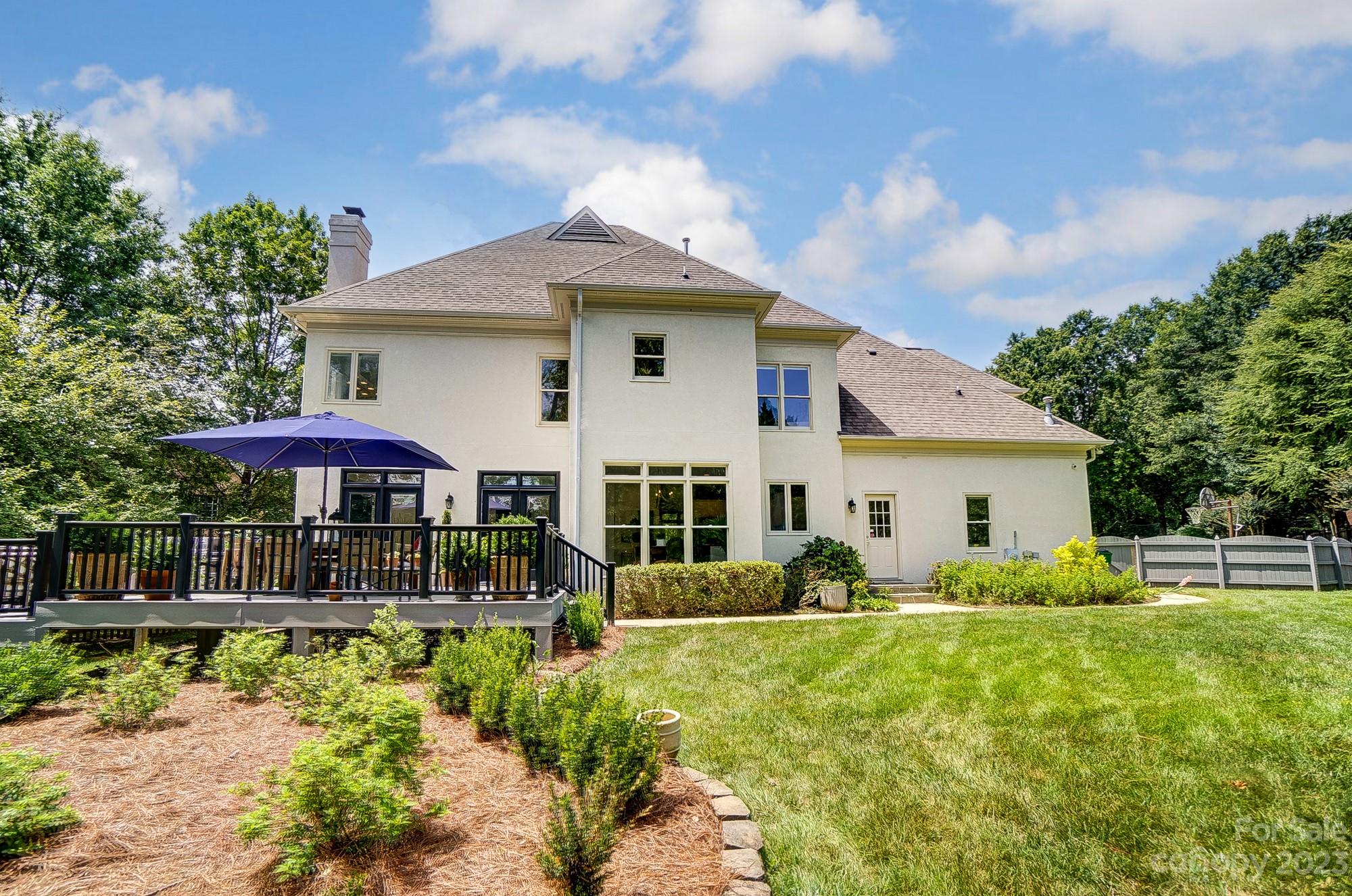 2407 Queensland Drive Charlotte, NC 28270 - Photo 36 of 42 a front view of house with yard and trees around