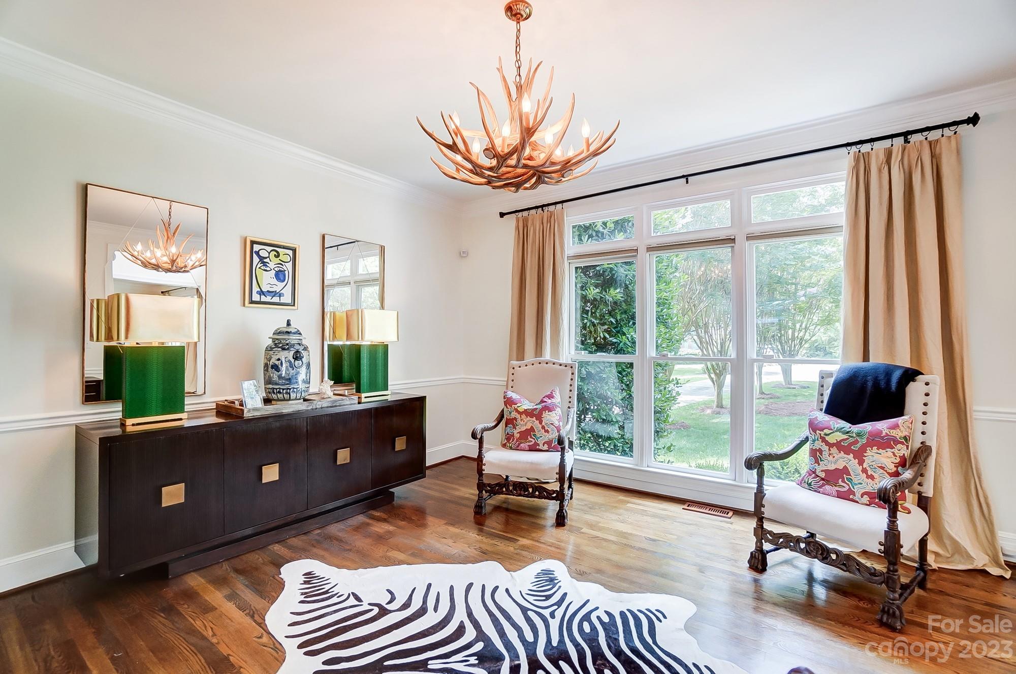 2407 Queensland Drive Charlotte, NC 28270 - Photo 6 of 42 a living room with furniture and a large window