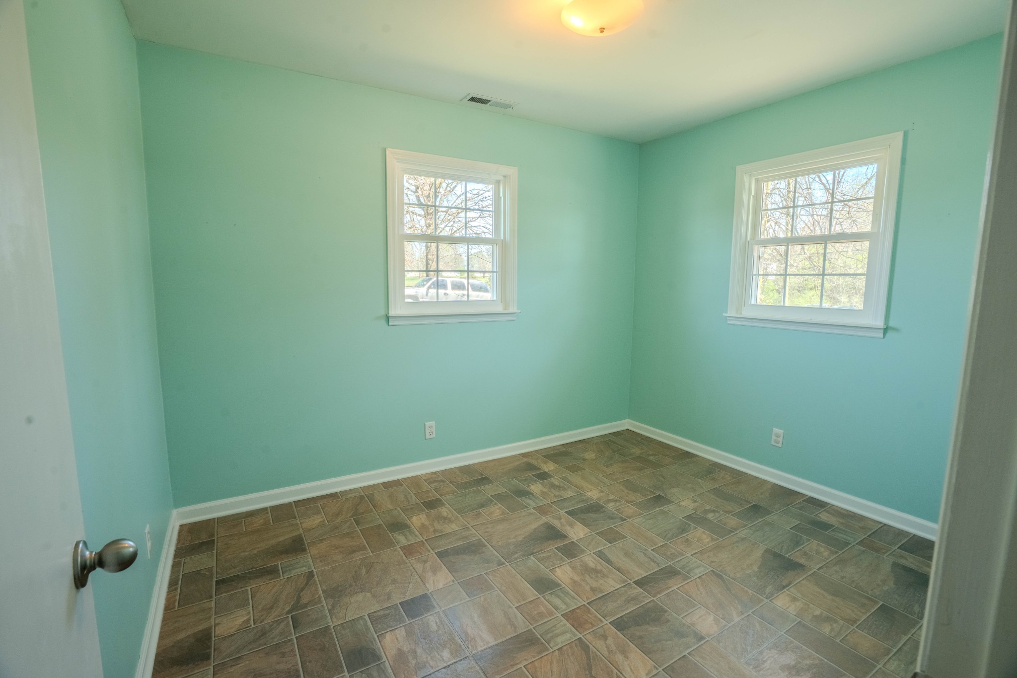 705 North Military Street Loretto, TN 38469 - Photo 16 of 16 an empty room with windows