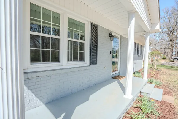 a front view of a house with outdoor space