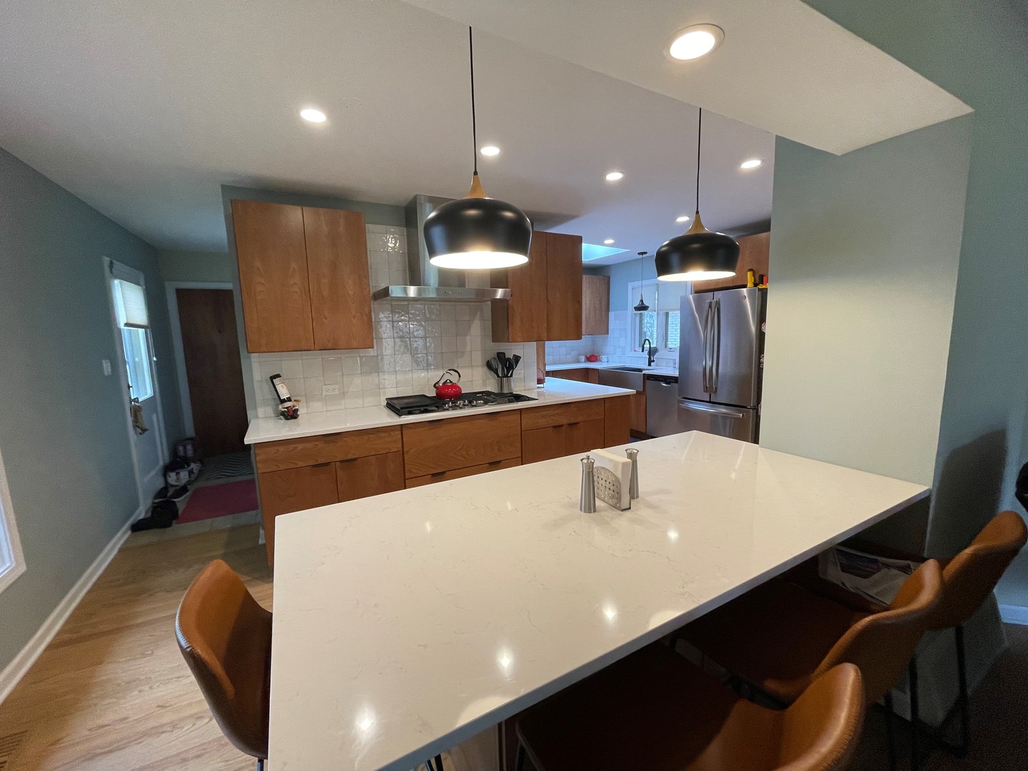 2S050 Taylor Road Glen Ellyn, IL 60137 - Photo 12 of 24 a large kitchen with a table and chairs