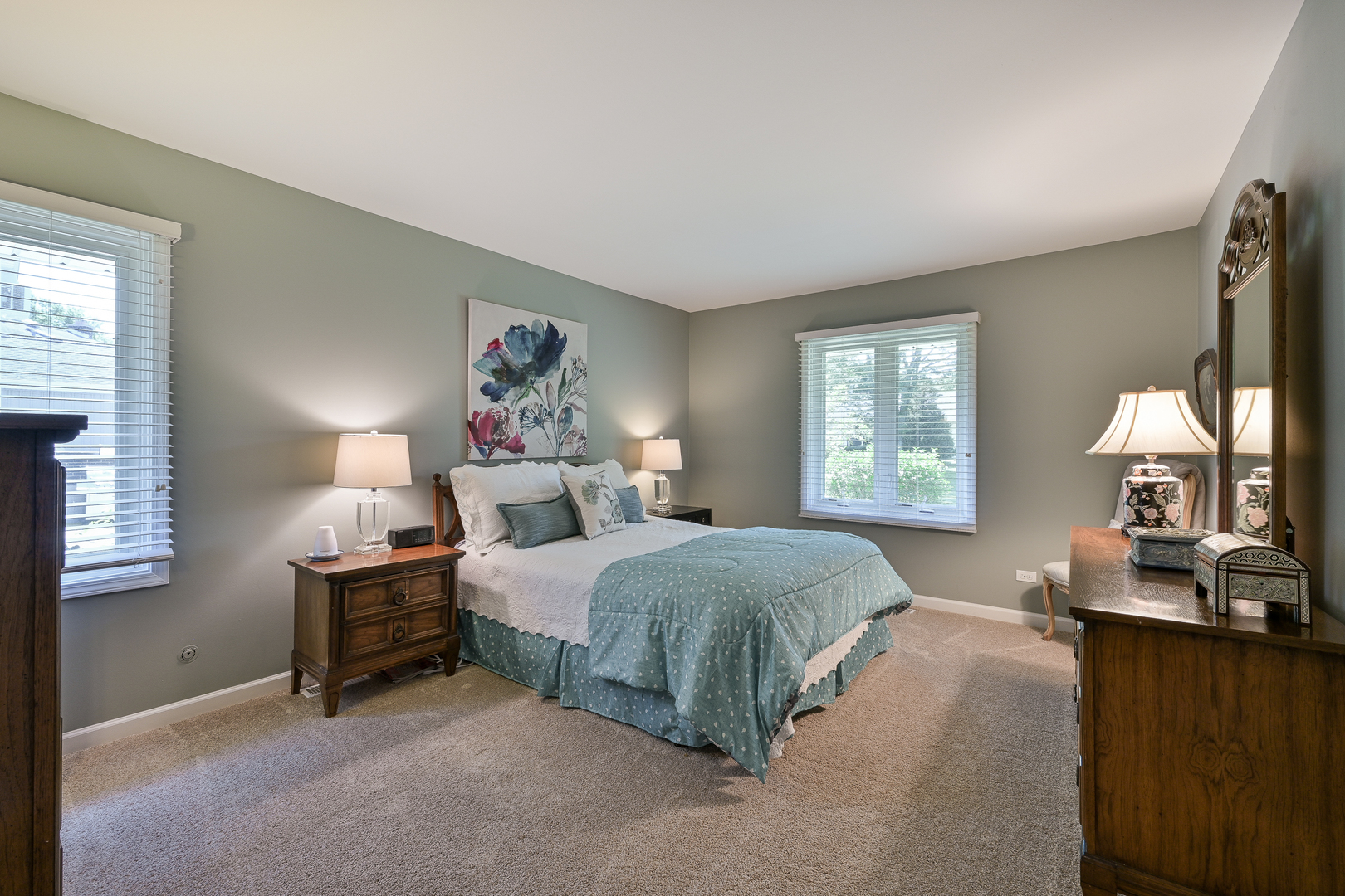2S050 Taylor Road Glen Ellyn, IL 60137 - Photo 13 of 24 a spacious bedroom with a bed and a dresser next to a window