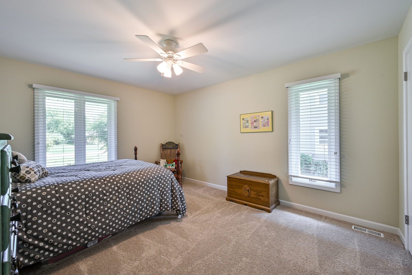 2S050 Taylor Road Glen Ellyn, IL 60137 - Photo 16 of 24 a bedroom with a bed and a window
