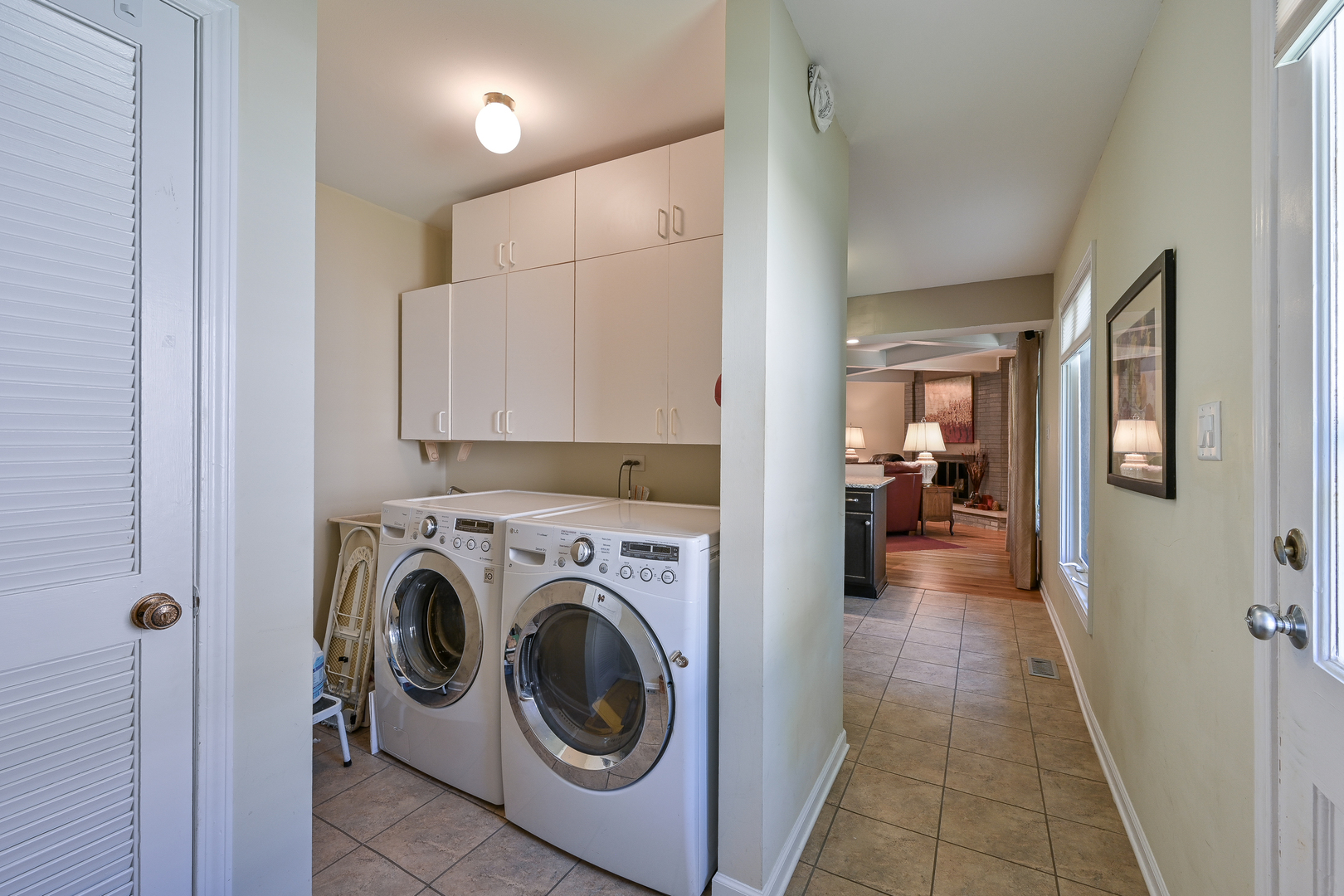 2S050 Taylor Road Glen Ellyn, IL 60137 - Photo 19 of 24 a view of a hallway with washer and dryer