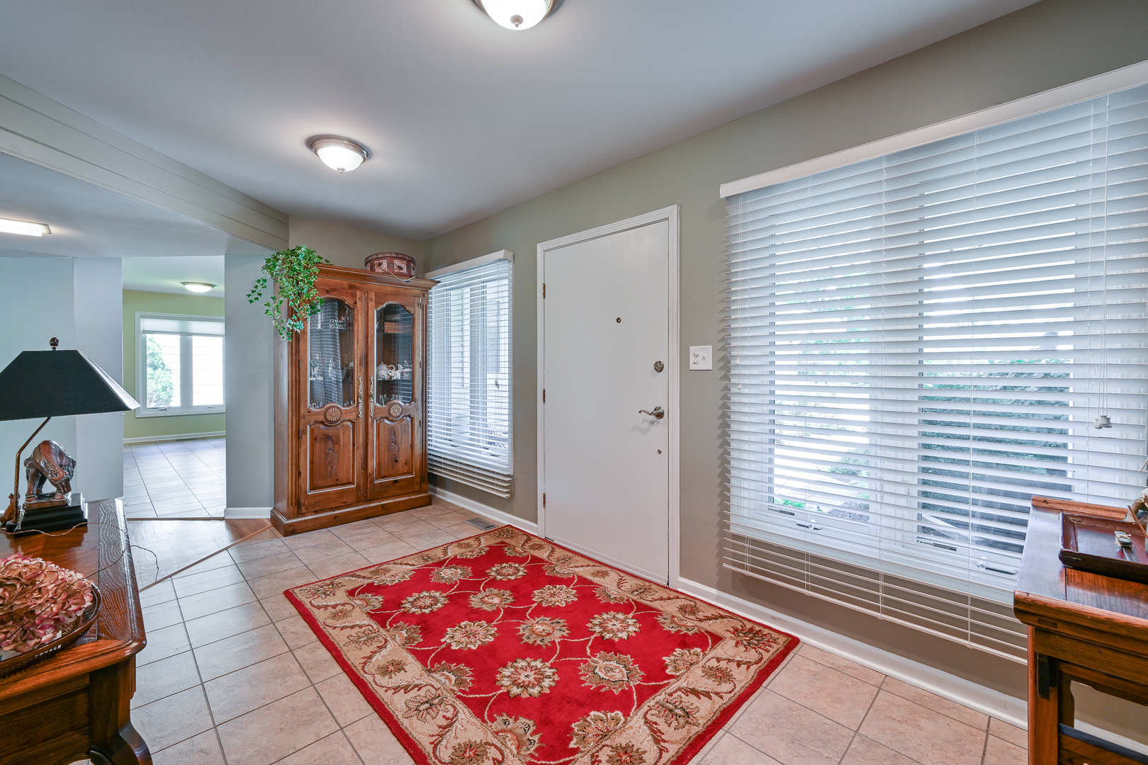 2S050 Taylor Road Glen Ellyn, IL 60137 - Photo 3 of 24 a living room with furniture and a window