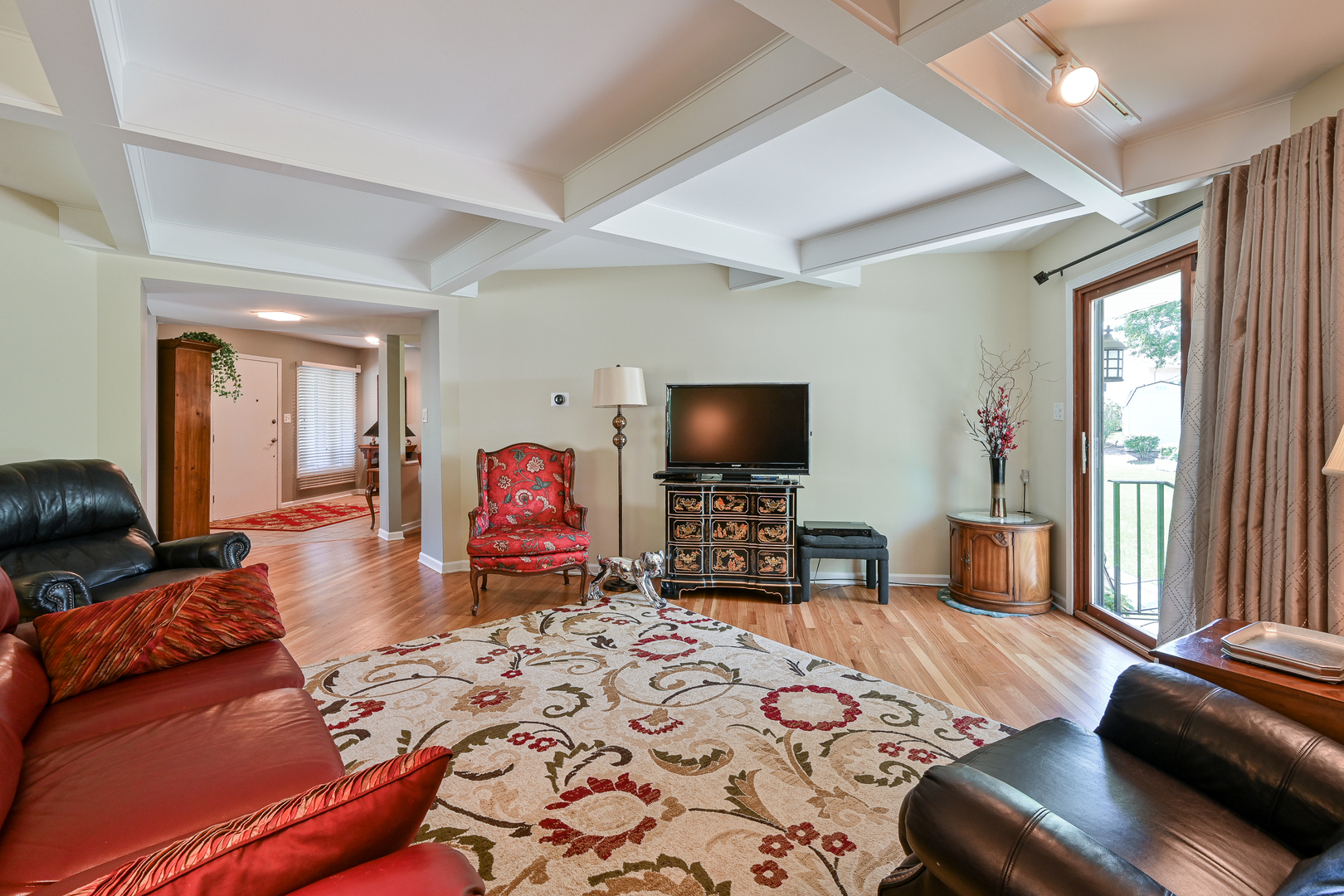 2S050 Taylor Road Glen Ellyn, IL 60137 - Photo 8 of 24 a bedroom with a bed and a flat screen tv