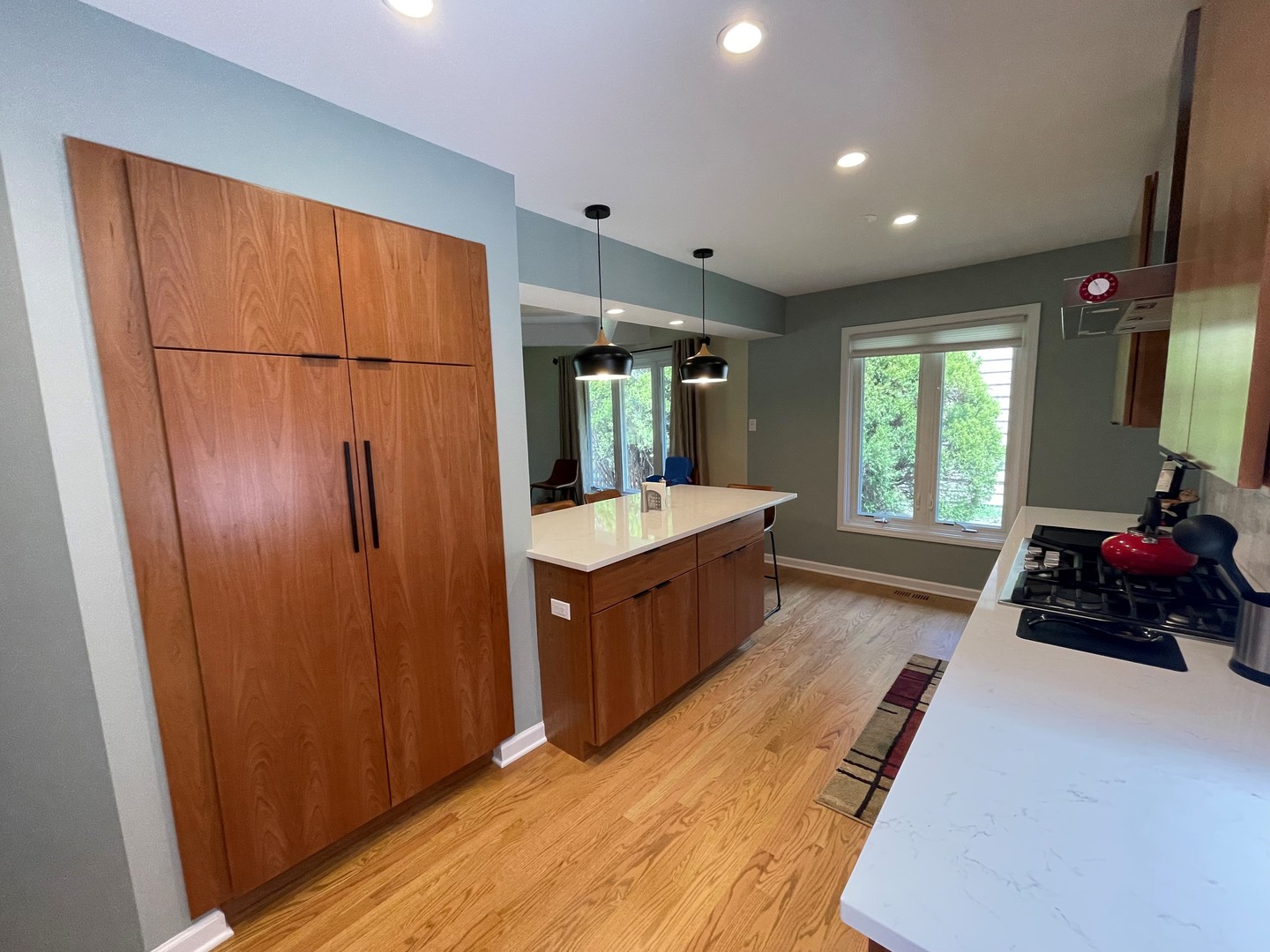 2S050 Taylor Road Glen Ellyn, IL 60137 - Photo 10 of 24 a large bedroom with a bed and a large mirror