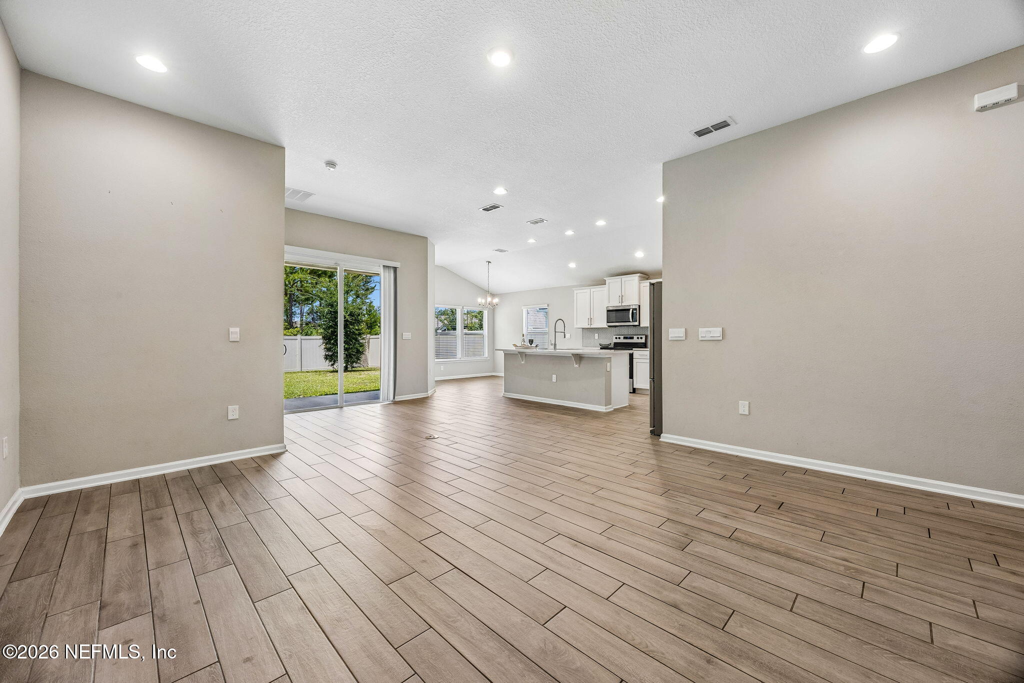 65908 Edgewater Drive Yulee, FL 32097 - Photo 5 of 49 Open to Kitchen